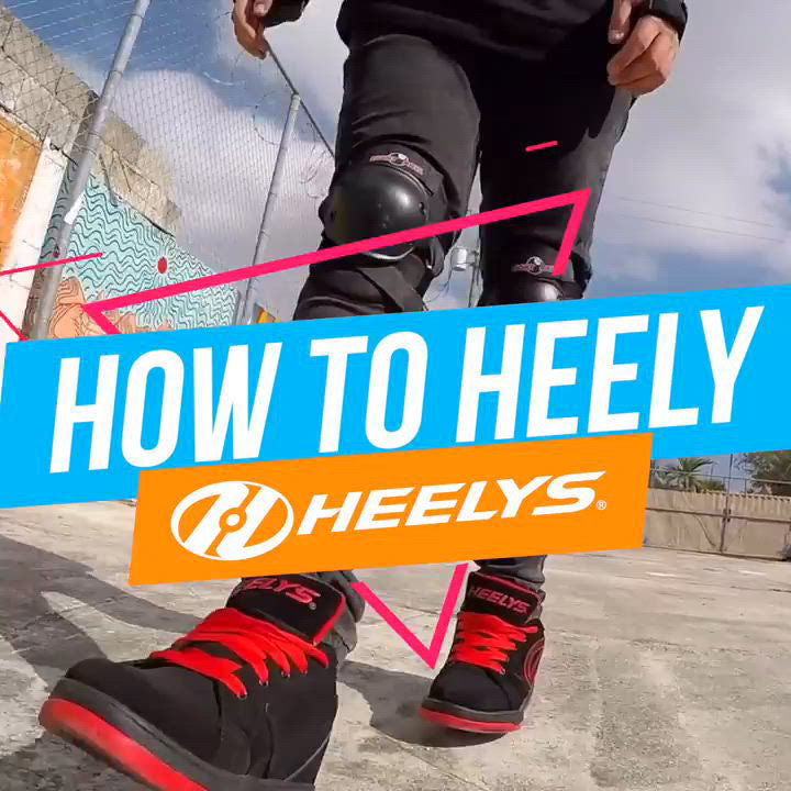 Person wearing Heelys with text overlay 'How to Heely' and brand logo.