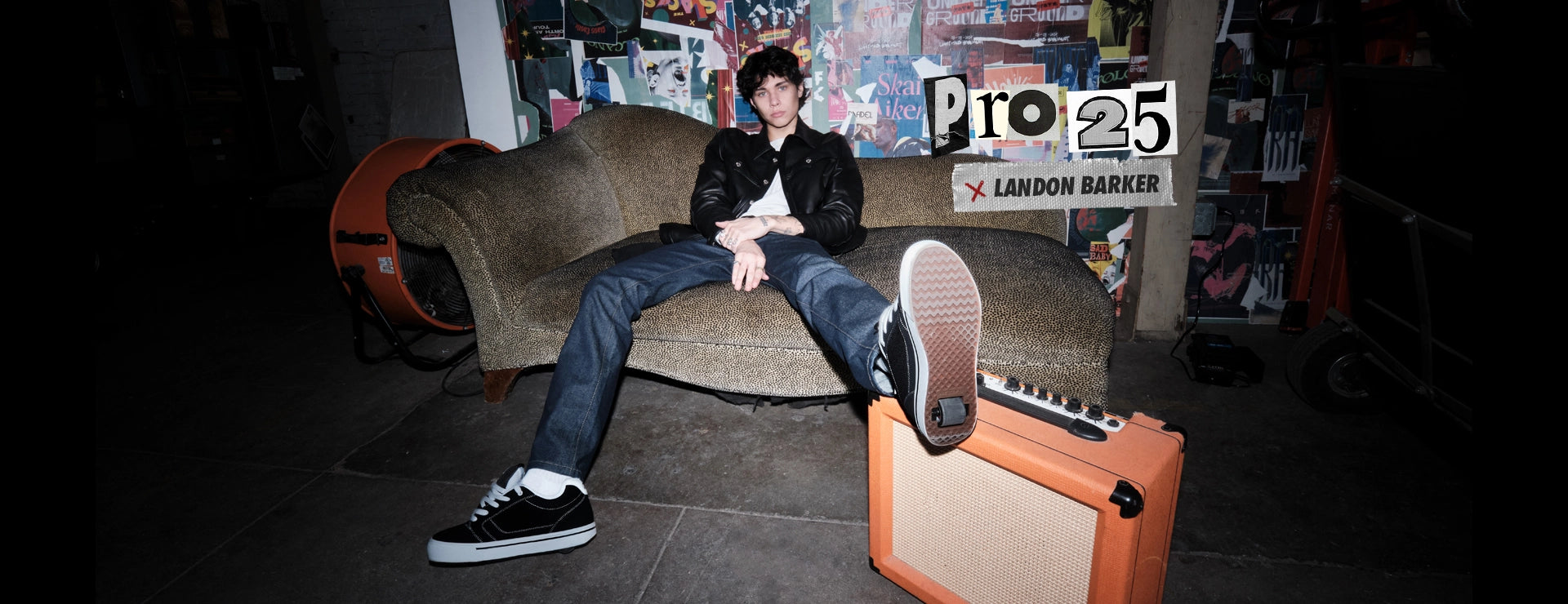 Landon Barker sitting on a couch, surrounded by posters and a 'Pro 25' sign.
